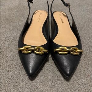 Coach Black Leather Flats with Gold Chain Accent